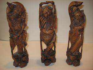 three-wood-carvings